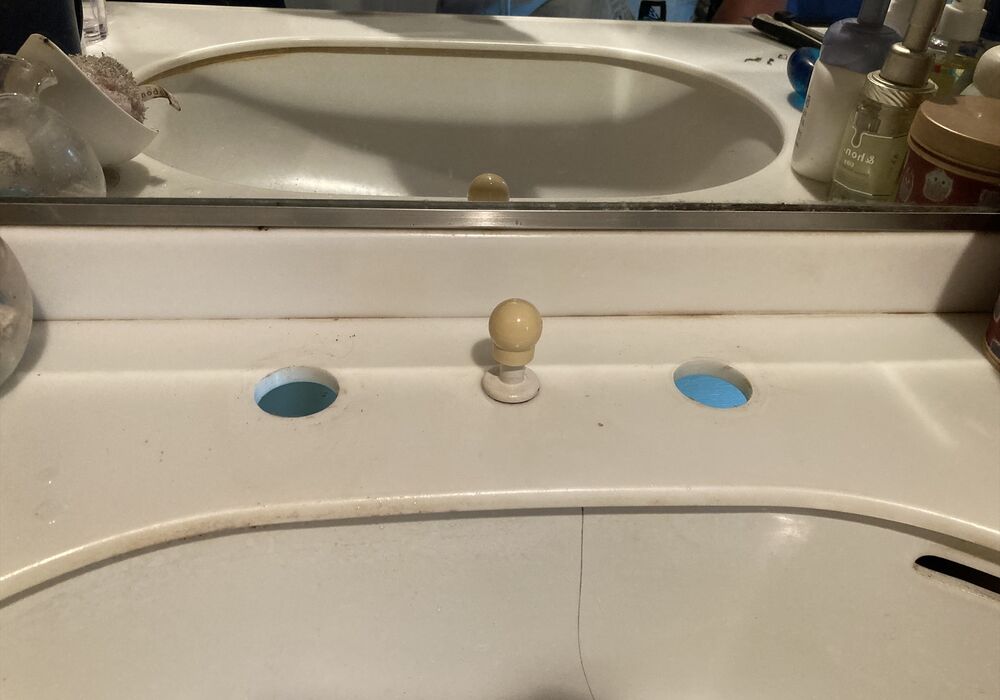 洗面所水栓取替中